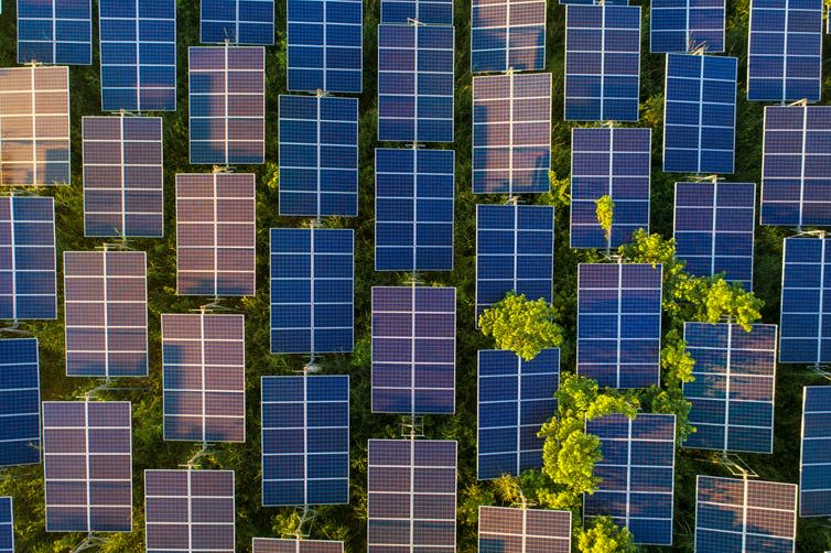 <span class="caption">Renewable energy production has not led to a reduction in fossil fuel use.</span> <span class="attribution"><a class="link " href="https://www.shutterstock.com/image-photo/top-view-solar-panels-cell-farm-727265002?src=tShmKoJEbOXgJJ_RKOW6Qw-1-81" rel="nofollow noopener" target="_blank" data-ylk="slk:Thongsuk Atiwannakul/Shutterstock.com;elm:context_link;itc:0;sec:content-canvas">Thongsuk Atiwannakul/Shutterstock.com</a></span>