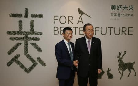 Jack Ma, founder and Executive Chairman of Alibaba Group shakes hands with U.N. Secretary-General Ban Ki-moon during the inaugural "Xin" Philanthropy Conference in Hangzhou, Zhejiang Province, China, July 9, 2016. China Daily/via REUTERS