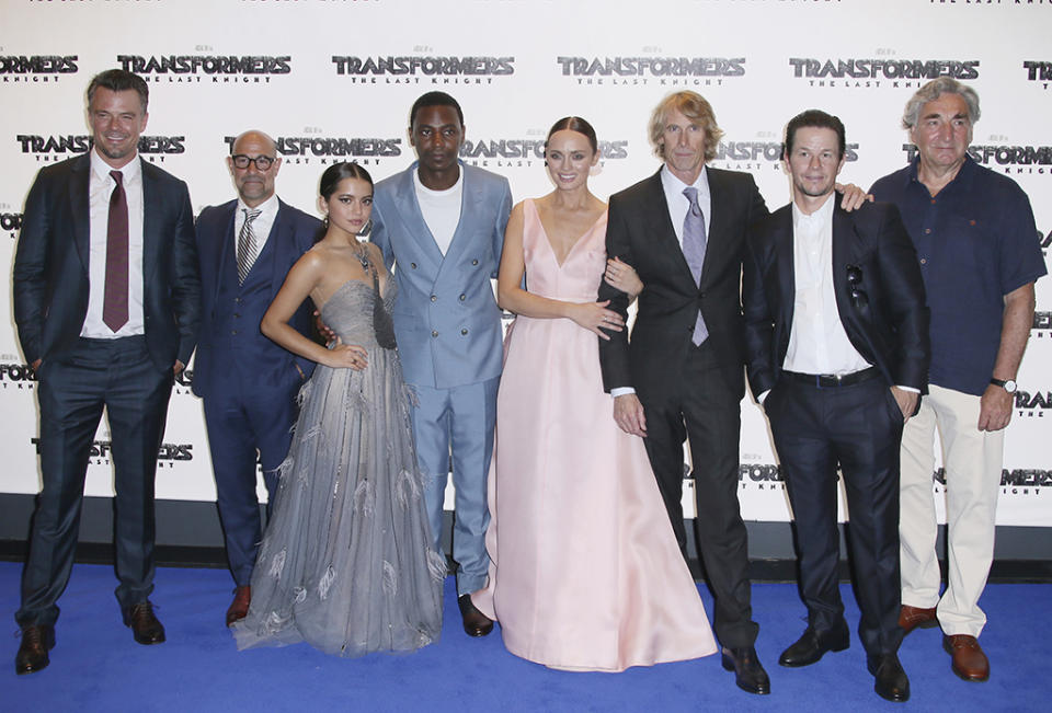 <p>Duhamel, Stanley Tucci, Moner, Jerrod Carmichael, Haddock, Bay, Wahlberg, and Jim Carter pose at the London premiere of <em>The Last Knight</em>. (Photo: Joel Ryan/Invision/AP) </p>