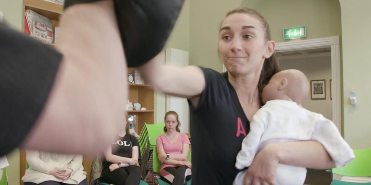 A Norland nanny-in-training spars with fake baby in hand to learn how to protect her client's children from attackers.