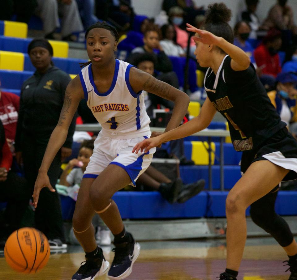 Rickards senior guard Jakiyah Robinson (4) dribbles the ball down court in a game against Florida High on Jan. 11, 2022 at Rickards High School. The Seminoles won 56-49.