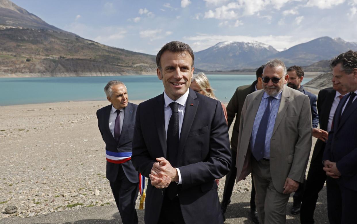 Emmanuel Macron speaks to journalists in Savines-le-Lac about his water plans - Sebastien Nogier/Shutterstock