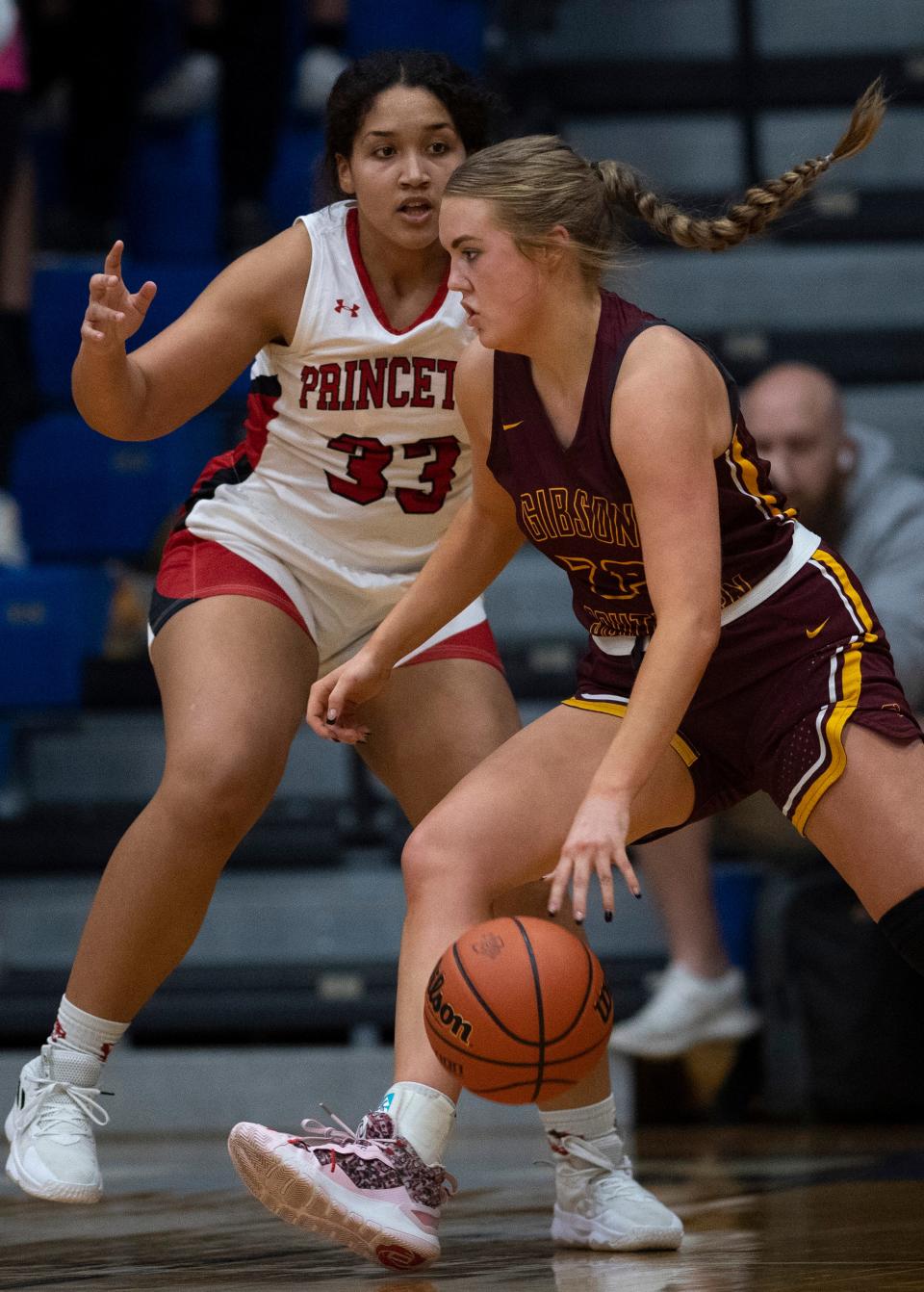 Princeton's Kiara Banks (33) guards Gibson Southern's Ava Weisheit (33) during their Class 3A regional at Charlestown High School  Saturday night, Feb. 11, 2023. Gibson Southern beat Princeton 71-55 to advance to semi-state next Saturday, Feb. 18, 2023.