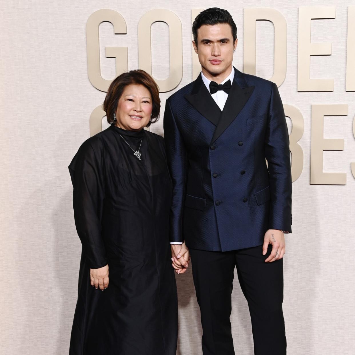  Charles Melton and his mother at the 2024 Golden Globes. 