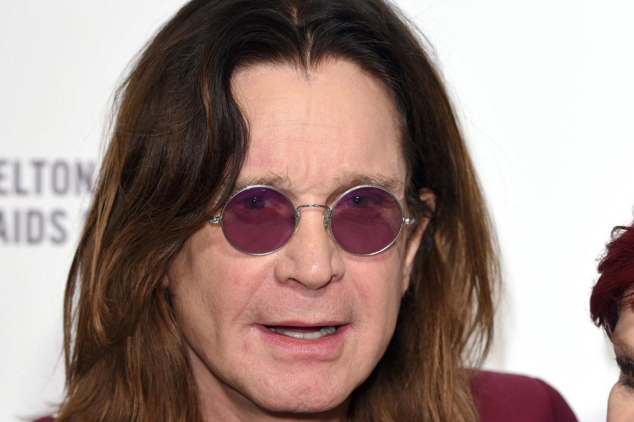 Ozzy Osbourne, pictured in 2015, has been admitted to hospital after suffering from flu: PA