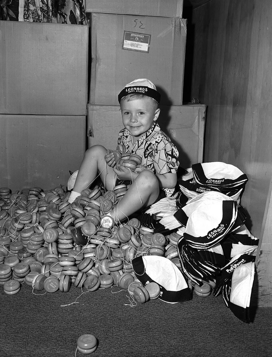 Sept. 3, 1952: Bobby Blankenship shown with caps and yo-yos to be given away by Leonard’s Department Store in Fort Worth. He’s wearing a Leonards Department Store cap.