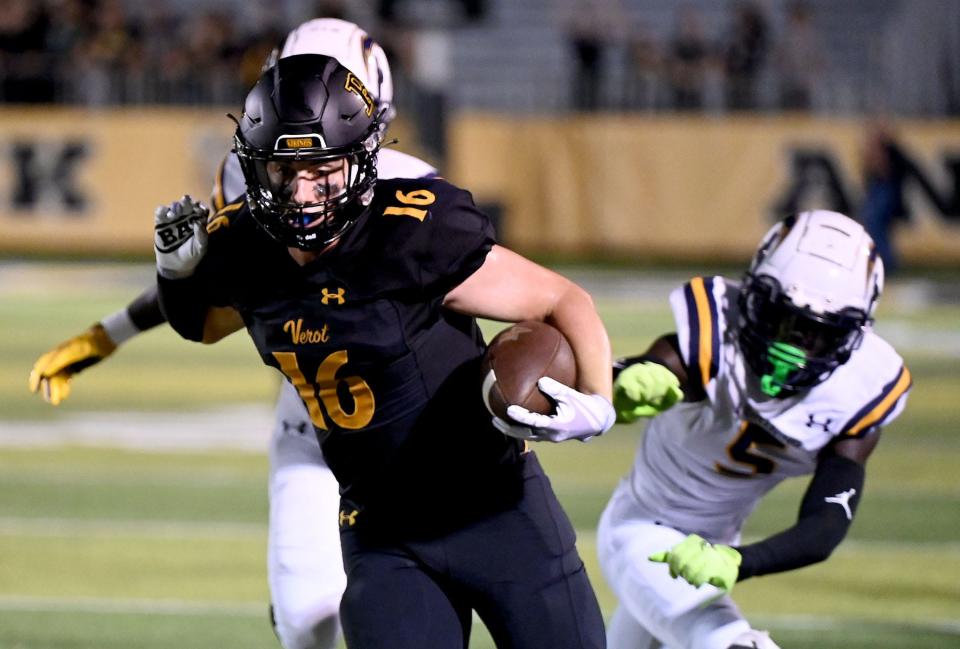 Bishop Verot’s Timmy Lawson (16) gets around two Lehigh High School defenders during their game on Friday night in Fort Myers, Friday, September 2, 2022.(Chris Tilley Photo)