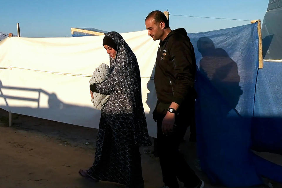 Baby Anas Stateh with his mother Wardeh and father Jalal in Rafah, southern Gaza. (NBC News)