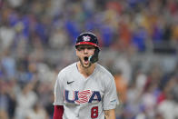 United States' Trea Turner celebrates after he hit a go-ahead grand slam during the eighth inning of a World Baseball Classic game against Venezuela, Saturday, March 18, 2023, in Miami. Tim Anderson, J.T. Realmuto and Bobby Witt Jr. scored on the play. (AP Photo/Wilfredo Lee)