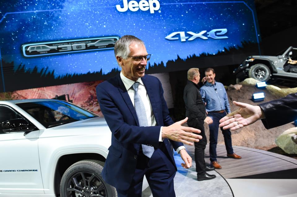 Stellantis CEO Carlos Tavares reaches out to shake a hand  during the 2022 North American International Auto Show held at Huntington Place in downtown Detroit on Wed., Sept. 14, 2022.