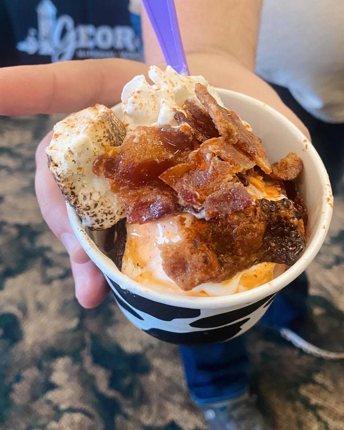 Southern Comfort Sundae at Polar Bear Ice Cream: homemade sweet potato ice cream with torched marshmallow, waffles, brown sugar, maple syrup, candied bacon, strawberries with a pinch of cayenne pepper