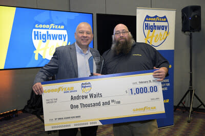 Cary Budzinski, senior director of Goodyear North American commercial sales, awards Andrew Waits the winner of the 2022 Goodyear Highway Hero Award at a news conference from the Technology &amp; Maintenance Council in Orlando, Florida on Feb. 26, 2023. (Phelan M. Ebanhack for Goodyear).