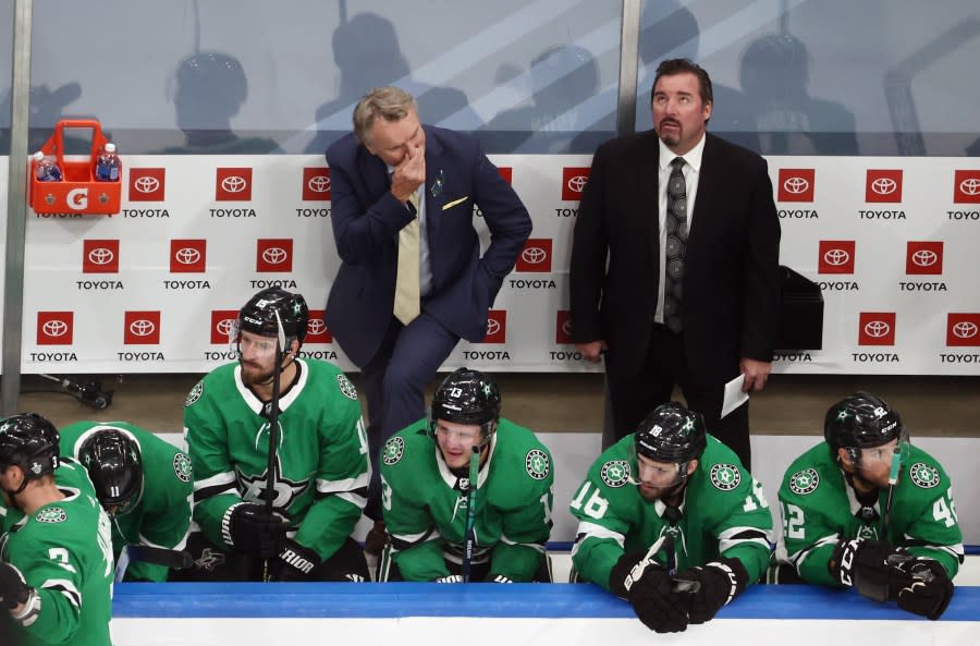 EDMONTON, ALBERTA – AUGUST 26: Head coach Rick Bowness of the <a class="link " href="https://sports.yahoo.com/nhl/teams/dallas/" data-i13n="sec:content-canvas;subsec:anchor_text;elm:context_link" data-ylk="slk:Dallas Stars;sec:content-canvas;subsec:anchor_text;elm:context_link;itc:0">Dallas Stars</a> and assistant coach Todd Nelson react near the end of their loss to the <a class="link " href="https://sports.yahoo.com/nhl/teams/colorado/" data-i13n="sec:content-canvas;subsec:anchor_text;elm:context_link" data-ylk="slk:Colorado Avalanche;sec:content-canvas;subsec:anchor_text;elm:context_link;itc:0">Colorado Avalanche</a> in Game Three of the Western Conference Second Round during the 2020 NHL Stanley Cup Playoffs at Rogers Place on August 26, 2020 in Edmonton, Alberta, Canada. (Photo by Bruce Bennett/Getty Images)