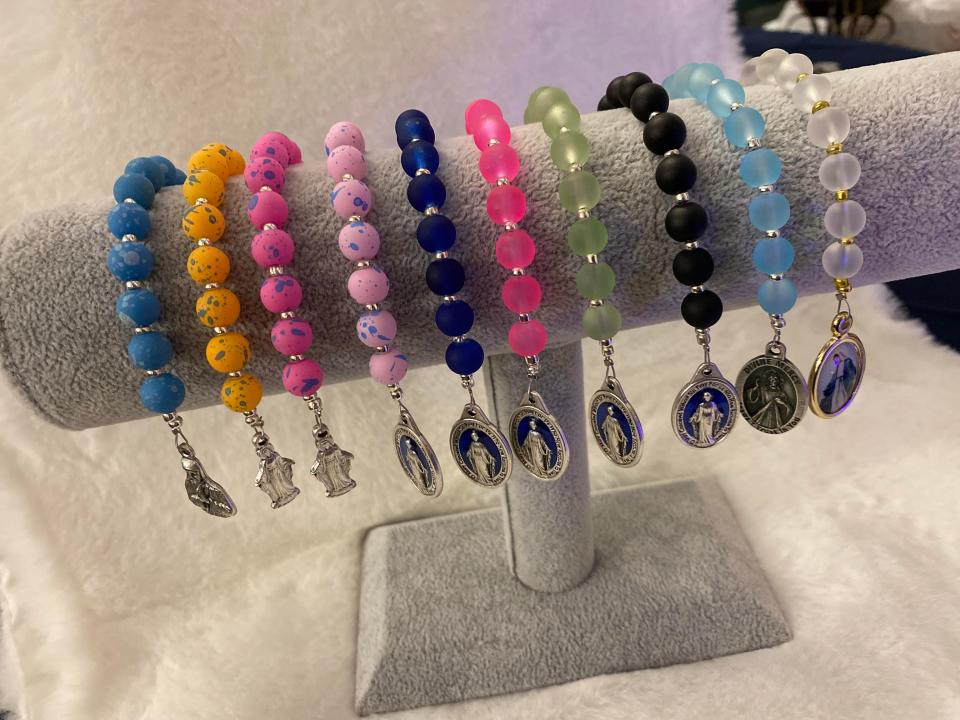 Ville Platte native Lauren Vallet, 23, makes and sells custom rosaries through her online business Rosaries by Lauren. What's unique about her items is that she personalizes them with beads that represent sports, medical professions and other activities and interests of the customer.