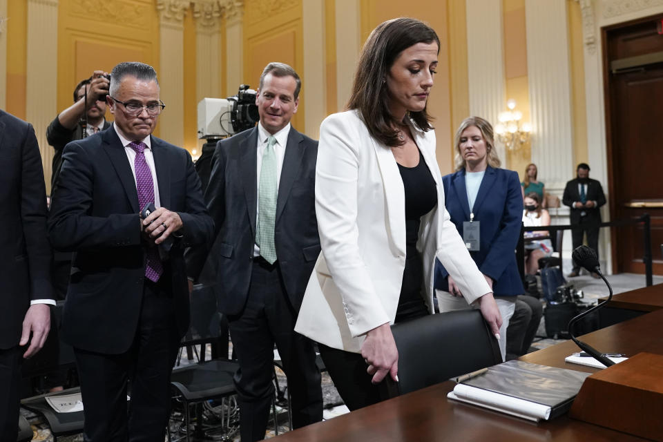 Cassidy Hutchinson, former aide to Trump White House chief of staff Mark Meadows, leaves after testifying as the House select committee investigating the Jan. 6 attack on the U.S. Capitol holds a hearing at the Capitol in Washington, Tuesday, June 28, 2022. (AP Photo/J. Scott Applewhite)