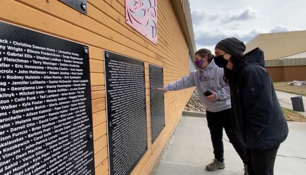 Recognize anyone? The new installation in Whitehorse includes the names of more than 800 people who played a role at Yukon College over the years. (Philippe Morin/CBC - image credit)