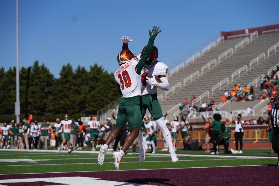 Florida A&M wide receivers Jah'Marae Sheread (10) and Marcus Riley celebrates Riley's 49-yard touchdown catch in a Southwestern Athletic Conference game at Louis Crews Stadium in Huntsville, Alabama, Saturday, November 4, 2023.