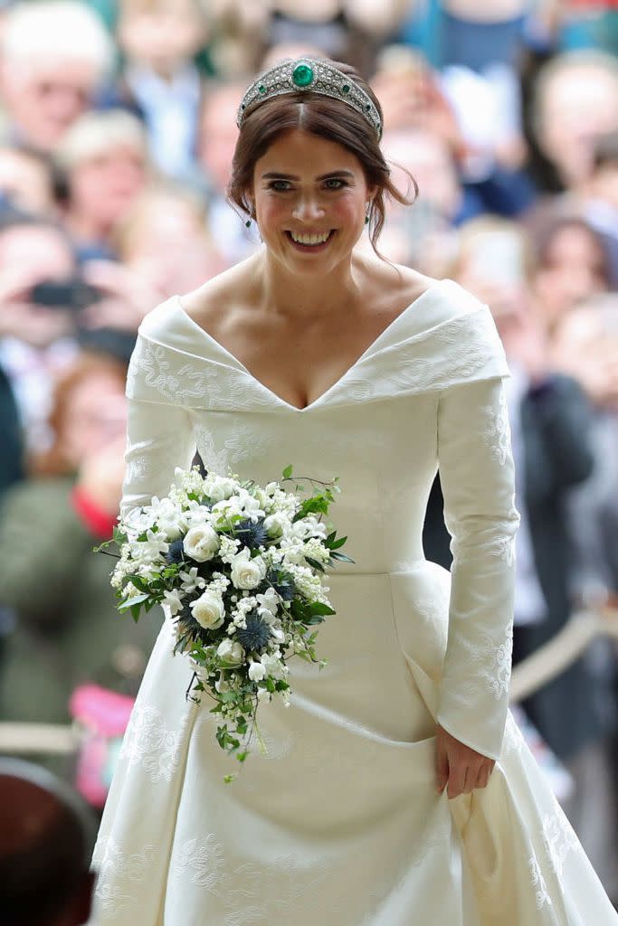 <p><strong>Wedding date: </strong>October 12, 2018</p><p><strong>Wedding tiara: </strong><a href="https://www.townandcountrymag.com/society/tradition/a15841755/princess-eugenie-jack-brooksbank-wedding/" rel="nofollow noopener" target="_blank" data-ylk="slk:Eugenie wore the;elm:context_link;itc:0;sec:content-canvas" class="link ">Eugenie wore the</a> Greville Emerald Kokoshnik tiara on her wedding day, which was lent to her by her grandmother, Queen Elizabeth. <a href="https://www.townandcountrymag.com/style/jewelry-and-watches/a22168053/princess-eugenie-wedding-tiara/?utm_campaign=likeshopme&utm_medium=instagram&utm_source=www.instagram.com/p/Bo1J1aVBSLP/&utm_content=www.instagram.com/p/Bo1J1aVBSLP/" rel="nofollow noopener" target="_blank" data-ylk="slk:The tiara was created in 1919;elm:context_link;itc:0;sec:content-canvas" class="link ">The tiara was created in 1919</a> by Boucheron for Margaret Greville, a British society fixture and philanthropist<strong>. </strong>When Greville died in 1942, she bequeathed the tiara to the Queen's mother<strong>. </strong>The gorgeous central emerald on the tiara is a whopping 93.7 carats in size. <strong><br></strong></p>