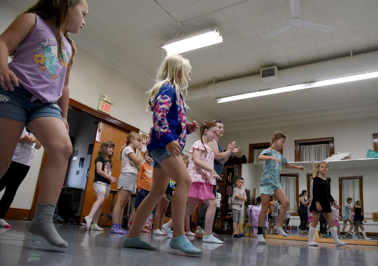 Dance teacher Lisa Lewandowski works with the students on different steps and movements in the Summer Theatre Arts Camp at River Raisin Centre for the Arts in Monroe.