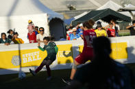 Mexico and Denmark play at the Homeless World Cup, Tuesday, July 11, 2023, in Sacramento, Calif. (AP Photo/Godofredo A. Vásquez)