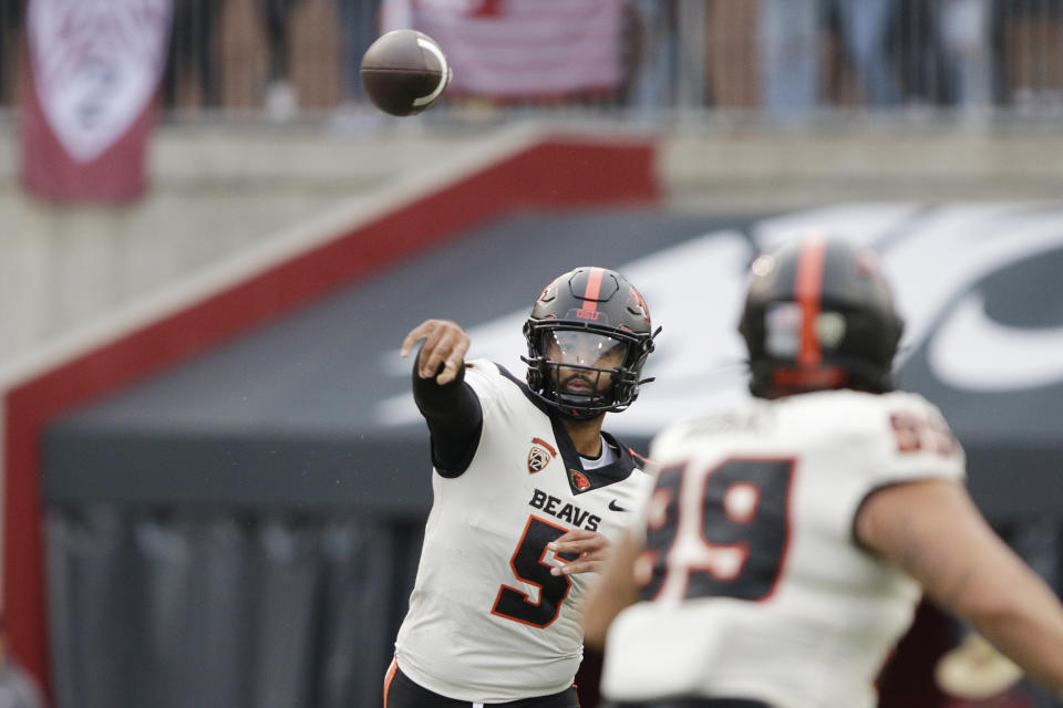 Oregon State quarterback DJ Uiagalelei (5) throws a pass during the first half of an NCAA college football game against Washington State, Saturday, Sept. 23, 2023, in Pullman, Wash. (AP Photo/Young Kwak)