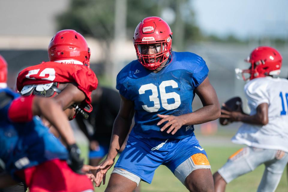 Jonathan Daniels (36) gets set to engage the defense during football practice at Pine Forest High School in Pensacola on Wednesday, Aug. 16, 2023.