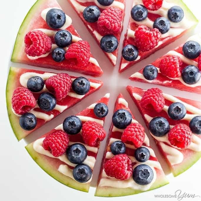 Watermelon "pizza" with berries and icing.