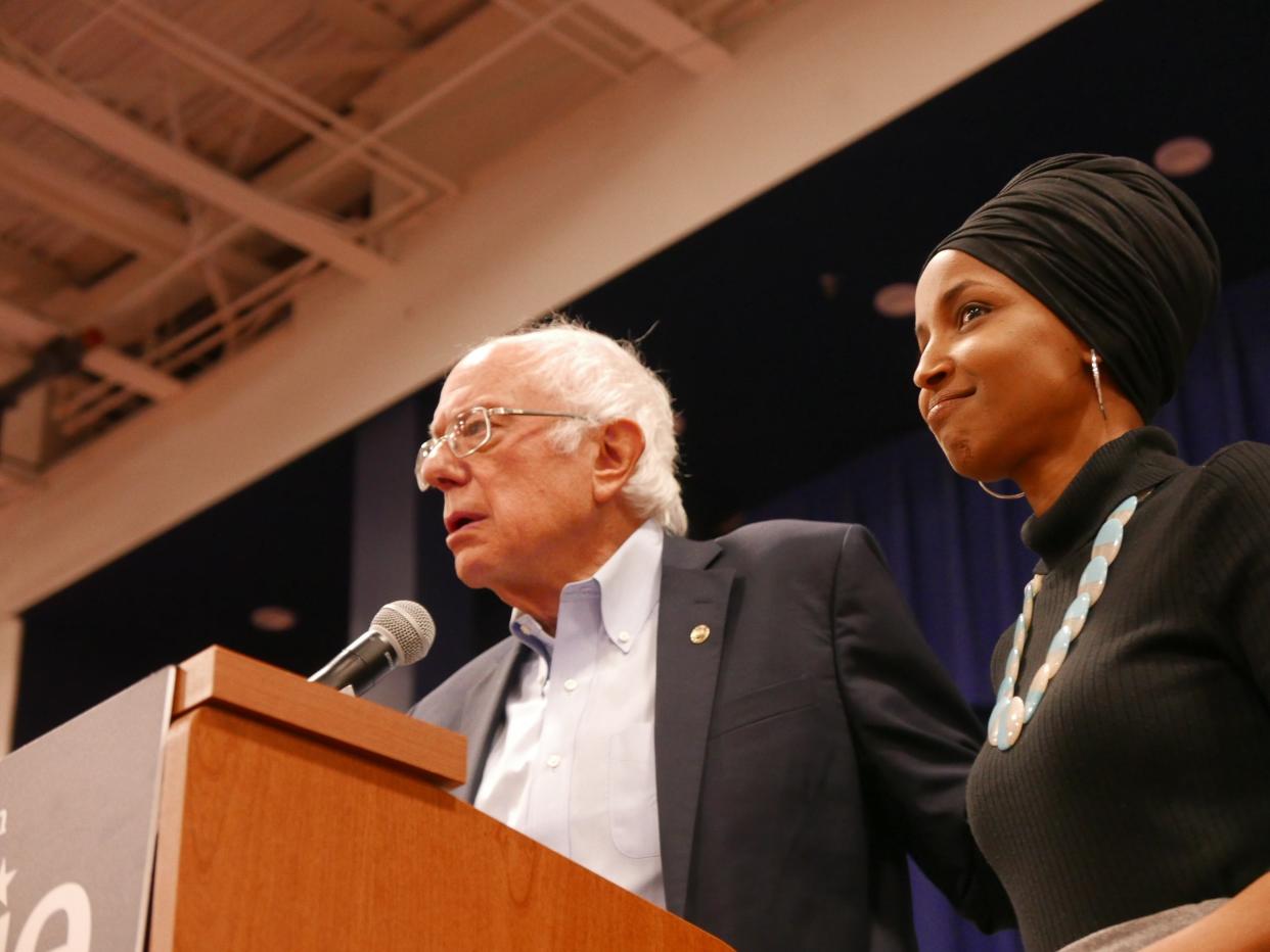 Sen. Bernie Sanders, I-Vt., and Rep. Ilhan Omar, D-Minn., at a campaign event. (Photo: Hunter Walker/Yahoo News)