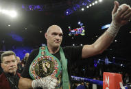 Tyson Fury, of England, celebrates after defeating Deontay Wilder during a WBC heavyweight championship boxing match Saturday, Feb. 22, 2020, in Las Vegas. (AP Photo/Isaac Brekken)