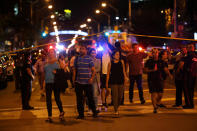 <p>People leave an area taped off by the police near the scene of a mass shooting in Toronto, Canada, July 22, 2018. (Photo: Chris Helgren/Reuters) </p>