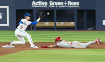 FILE - Philadelphia Phillies' Bryson Stott steals second base ahead of the throw to Toronto Blue Jays second baseman Cavan Biggio during the seventh inning of a baseball game Tuesday, Aug. 15, 2023, in Toronto. Stott swiped 31 bags in 34 tries last season.(Spencer Colby/The Canadian Press via AP, File)