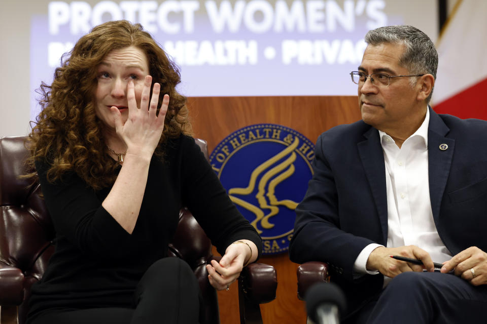 Stephanie Perry fights back tears as she shares her story to Secretary of U.S. Health and Human Services, Xavier Becerra who hosted a panel discussion with families directly affected by the Alabama Supreme Court Court decision, Tuesday, Feb. 27, 2024, in Birmingham, Ala. (AP Photo/ Butch Dill)