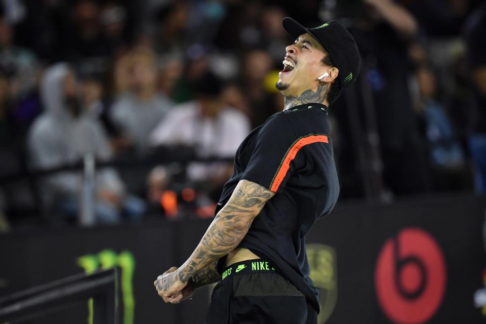 Nyjah Huston celebrates after winning the Street League Skateboarding world championship men's final in Sao Paulo, Brazil.