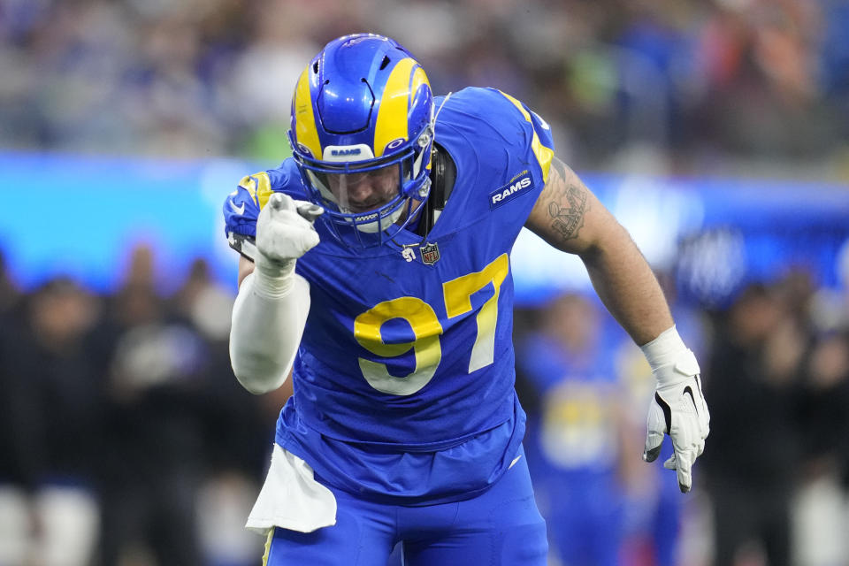 Los Angeles Rams defensive tackle Michael Hoecht celebrates after sacking Denver Broncos quarterback Russell Wilson during the second half of an NFL football game between the Los Angeles Rams and the Denver Broncos on Sunday, Dec. 25, 2022, in Inglewood, Calif. (AP Photo/Marcio J. Sanchez)