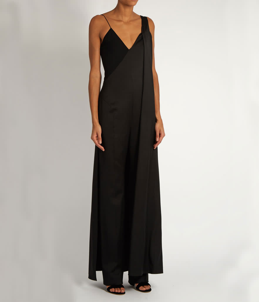 <p>Cape Back Wide Leg Wool Jumpsuit, $655,<a rel="nofollow noopener" href="https://www.matchesfashion.com/us/products/Esteban-Cort%C3%A1zar-Cape-back-wide-leg-wool-jumpsuit--1060158" target="_blank" data-ylk="slk:matchesfashion.com;elm:context_link;itc:0;sec:content-canvas" class="link "> matchesfashion.com</a> </p>