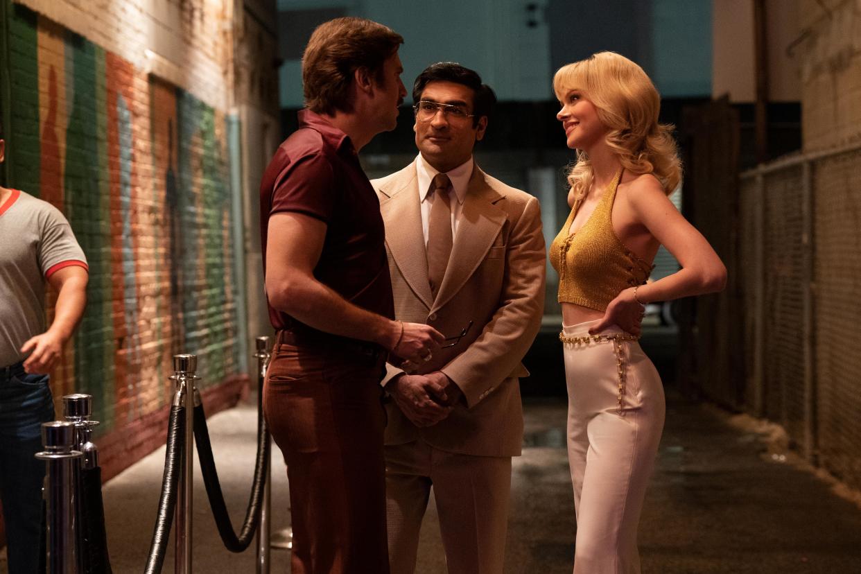 Paul Snider (Dan Stevens), Steve Banerjee (Kumail Nanjiani) and Dorothy Stratton (Nicola Peltz Beckham) - Welcome to the Chippendales (Disney+)