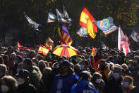 Police march during a protest in Madrid, Spain, Saturday, Nov. 27, 2021. Tens of thousands of Spanish police officers and their supporters rallied in Madrid on Saturday to protest against government plans to reform a controversial security law known by critics as the “gag law.” (AP Photo/Paul White)