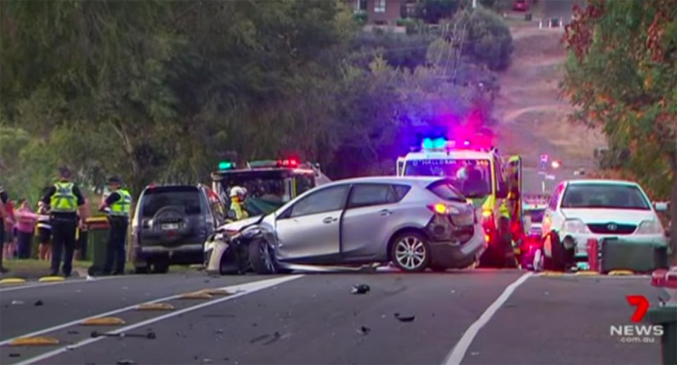 A damaged car sits across two lanes of traffic after colliding with a vehicle and then striking a pedestrian in Sheidow Park, South Australia.