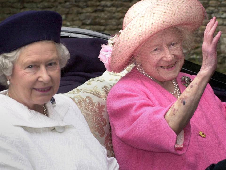 Queen Elizabeth II and the Queen Mother leaving church by horse drawn carriage on the Sandringham Estate in Norfolk, 2000 (PA)