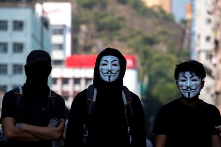 Anti-government protesters attend a protest on China's National Day in Hong Kong