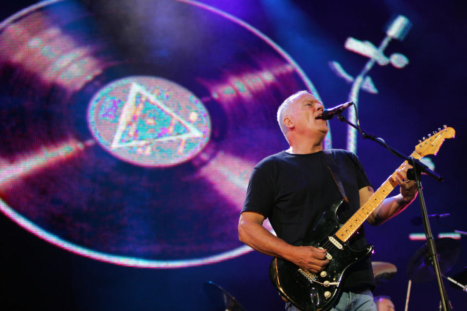 An impromptu Pink Floyd cover band concert was broken up by the police, who are begging the public to stop having &quot;corona parties.&quot; (Photo: JOHN D MCHUGH/AFP via Getty Images)