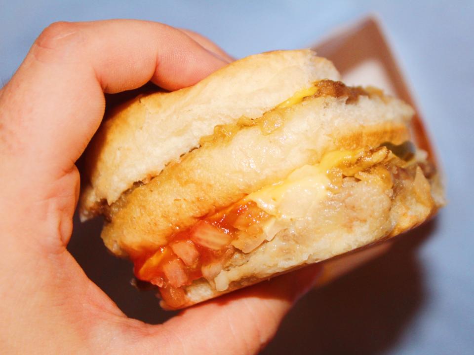 white castle double cheeseburger on blue background