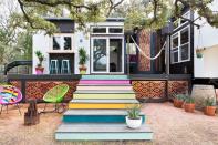 <p>The owner of this Austin abode turned two mobile trailers into one 400-square-foot home that's connected only by a deck.</p><p><a class="link " href="https://www.countryliving.com/home-design/house-tours/g3052/austins-colorful-400-square-foot-home" rel="nofollow noopener" target="_blank" data-ylk="slk:SEE INSIDE;elm:context_link;itc:0;sec:content-canvas">SEE INSIDE</a></p>