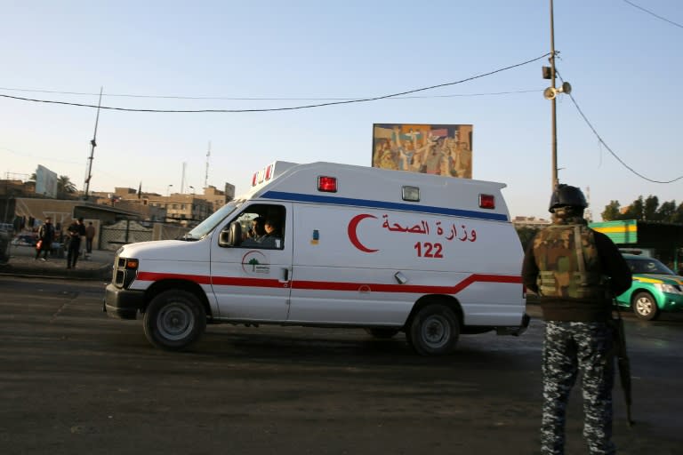 An ambulance in the area where a double suicide bombing killed 31 people in central Baghdad on January 15, 2018, the second such attack in the Iraqi capital in three days