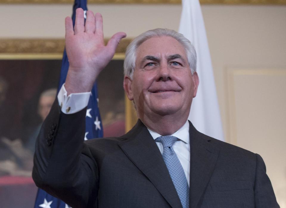 In this Feb. 10, 2017 photo, Secretary of State Rex Tillerson smiles while greeting the media during a meeting with Japan's Foreign Minister Fumio Kishida at the State Department in Washington. In his first weeks as America’s top U.S. diplomat, Secretary of State Rex Tillerson has gone to great lengths to avoid attracting attention. (AP Photo/Molly Riley)