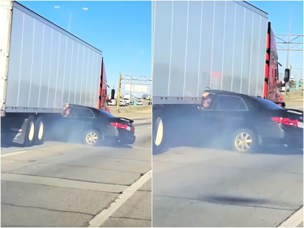 A driver waved for help while being dragged along the highway by a truck (Screenshot / Grzesiek Misiek / YouTube)