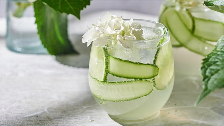 cocktail with cucumbers and flower