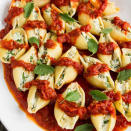 <p>Believe it or not, these stuffed jumbo shells are totally dairy-free. Instead of using cheese, the recipe features a healthy tofu ricotta that will fool anyone into thinking it's the real deal.</p><p><strong>Get the recipe at <a rel="nofollow noopener" href="http://ohsheglows.com/2013/03/13/jumbo-stuffed-shells/" target="_blank" data-ylk="slk:Oh She Glows;elm:context_link;itc:0;sec:content-canvas" class="link ">Oh She Glows</a>.</strong></p>