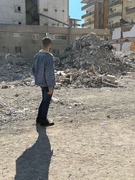 PHOTO: Adnan, 17, returns to the place where his home once stood after being pulled out alive from the rubble after four days, in Gaziantep, Turkey. (Ibtissem Guenfoud/ABC News)