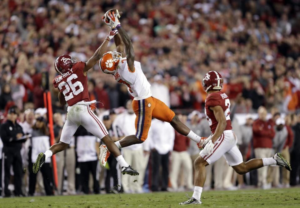 Clemson's Mike Williams catches a pass in front of Alabama's Marlon Humphrey during the second half of the NCAA college football playoff championship game Tuesday, Jan. 10, 2017, in Tampa, Fla. (AP Photo/Chris O'Meara)